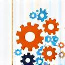 Stylized gears turning icon representing continuous improvement